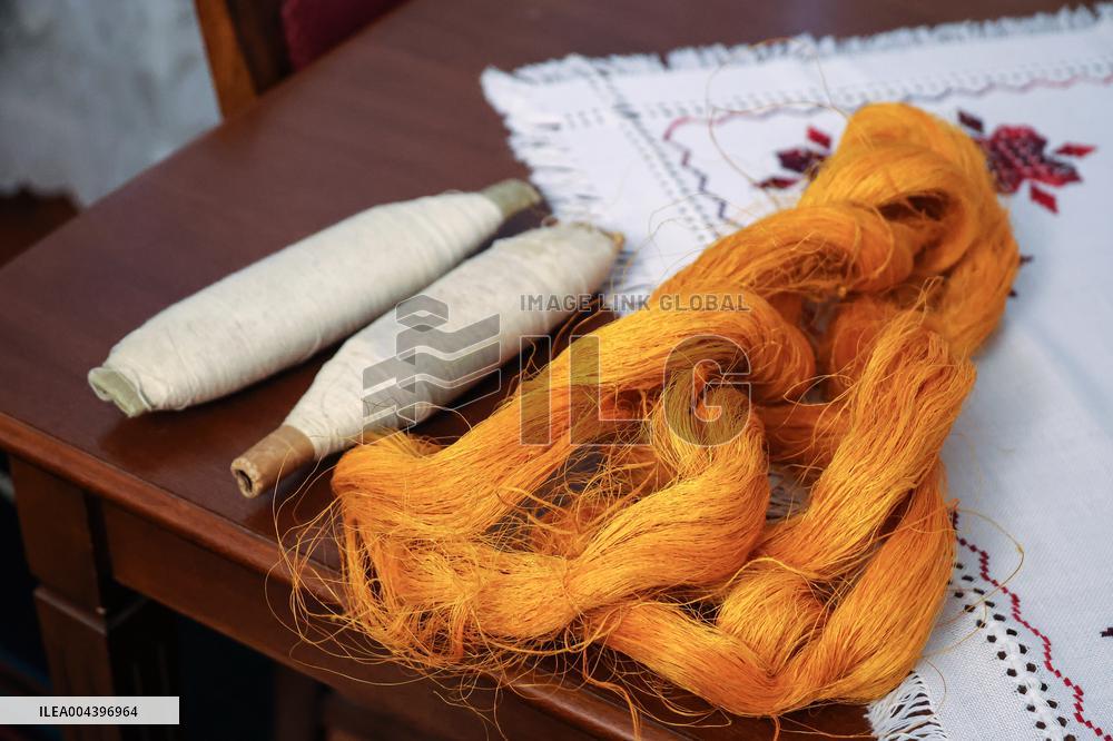 Collection of old Bulgarian towels, clothes and jewelry in Krynychne village