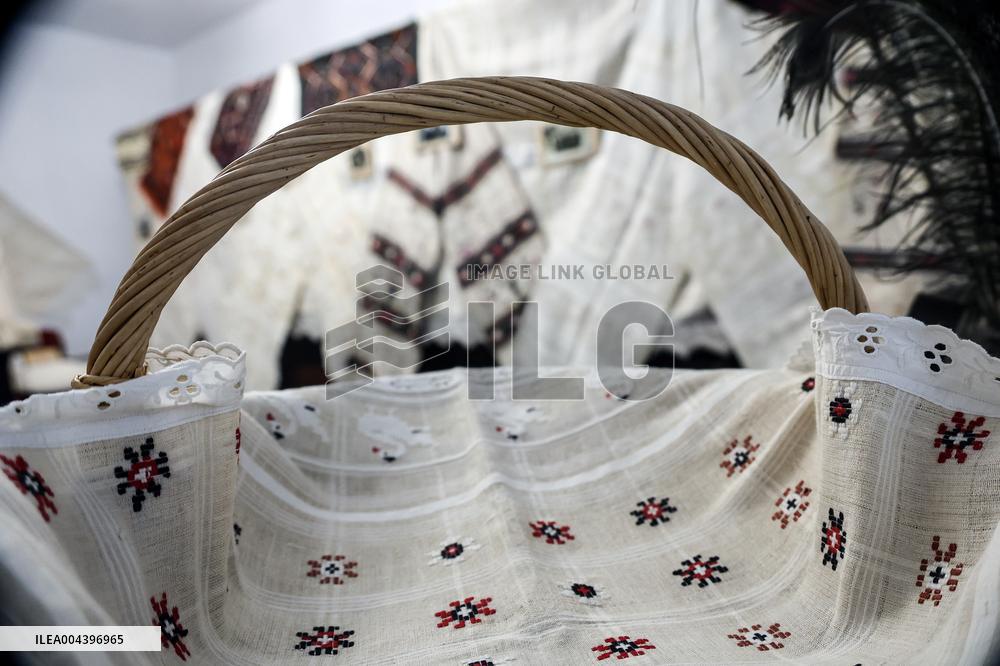 Collection of old Bulgarian towels, clothes and jewelry in Krynychne village