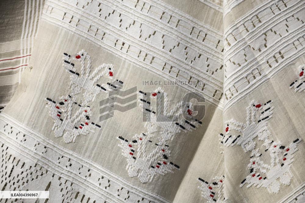 Collection of old Bulgarian towels, clothes and jewelry in Krynychne village