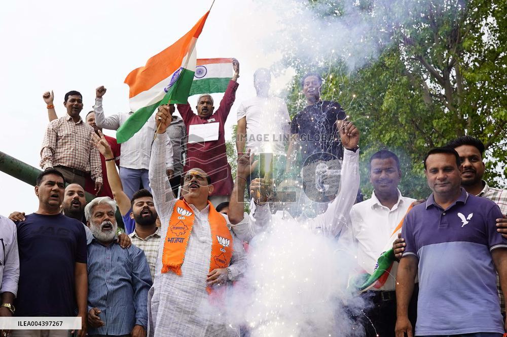 Supporters Wave Flag In Support Of Missile Strikes - India