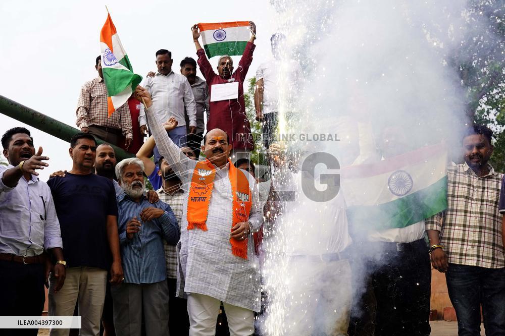 Supporters Wave Flag In Support Of Missile Strikes - India