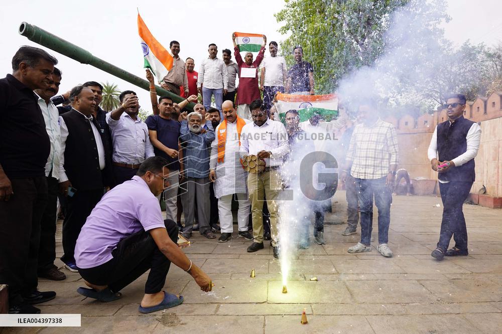 Supporters Wave Flag In Support Of Missile Strikes - India