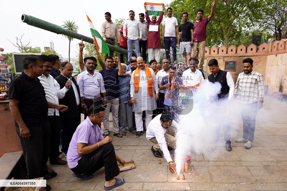 Supporters Wave Flag In Support Of Missile Strikes - India