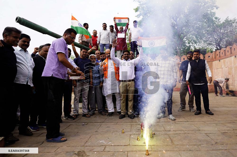 Supporters Wave Flag In Support Of Missile Strikes - India