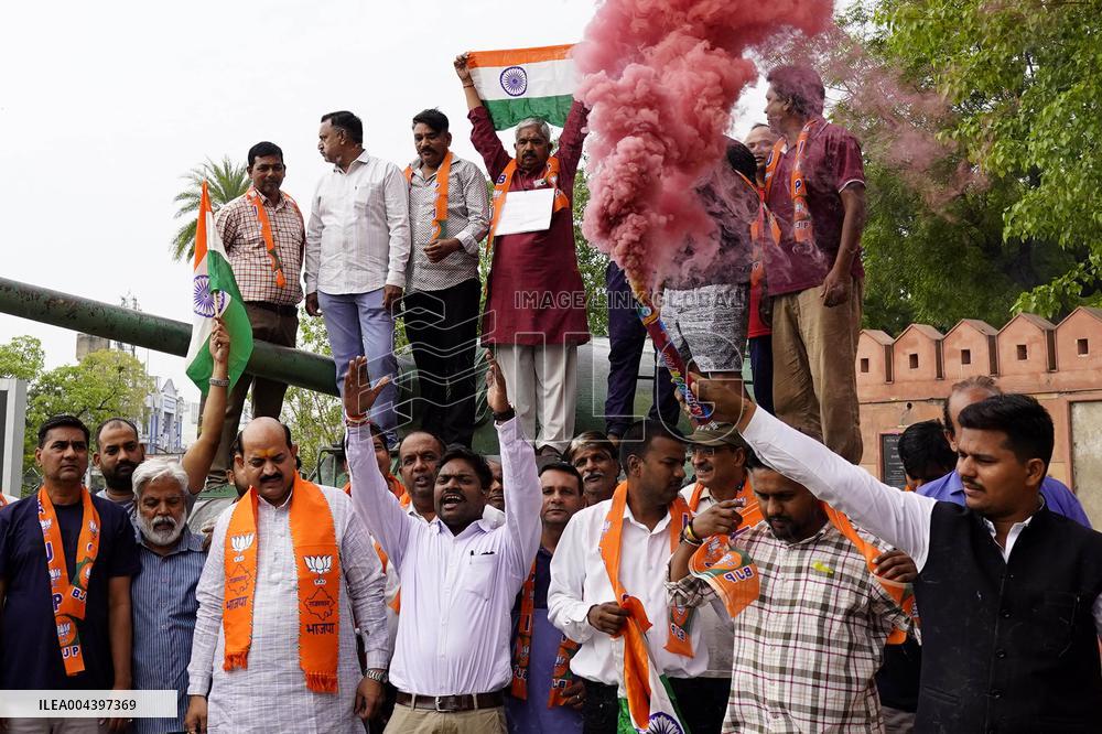 Supporters Wave Flag In Support Of Missile Strikes - India