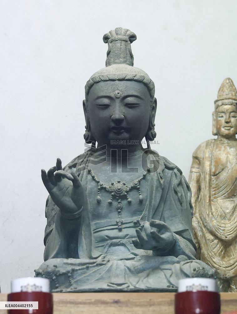 Stolen Buddhist statue returned to Japan