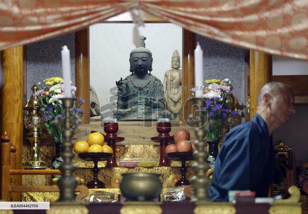 Stolen Buddhist statue returned to Japan