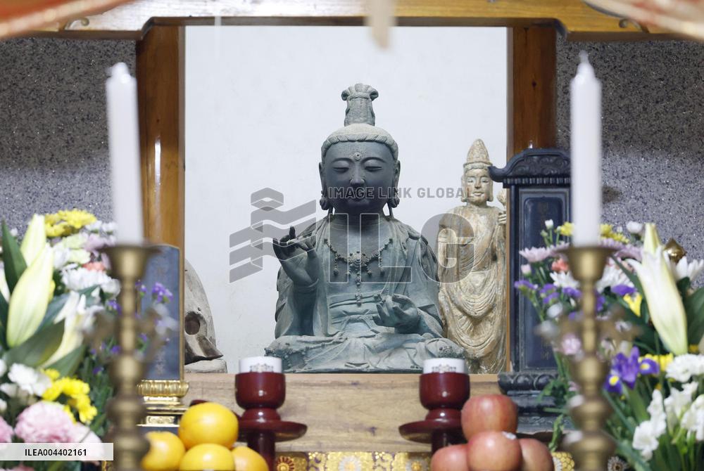 Stolen Buddhist statue returned to Japan