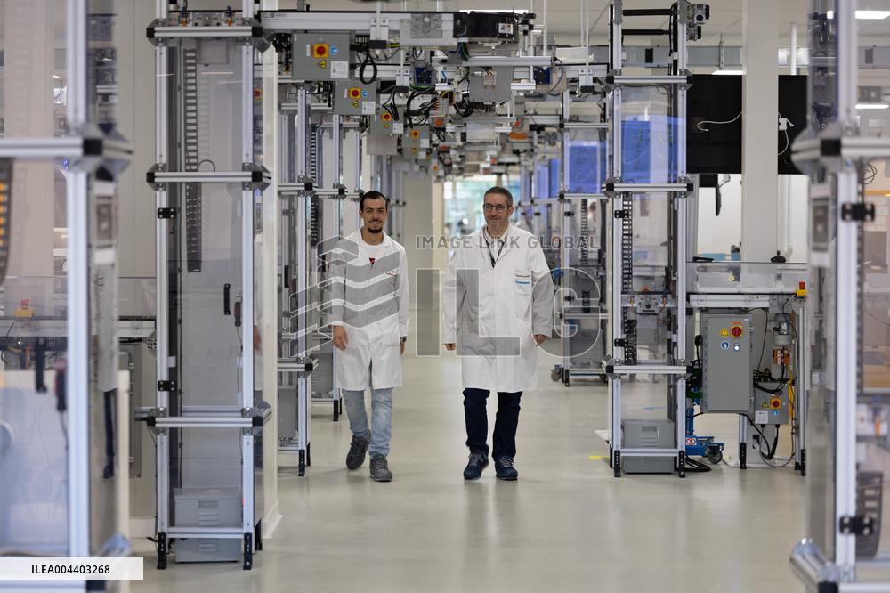 President Macron Visits EssilorLuxottica Laboratory - Wissous