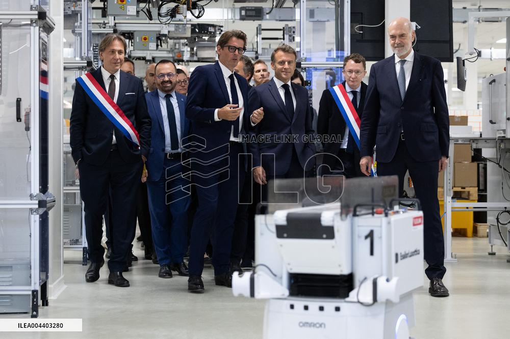 President Macron Visits EssilorLuxottica Laboratory - Wissous