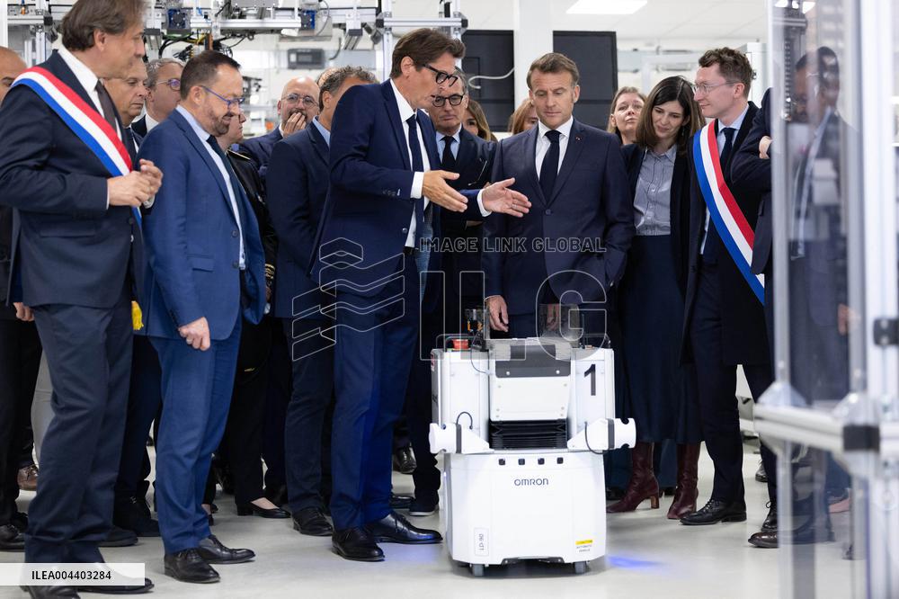 President Macron Visits EssilorLuxottica Laboratory - Wissous