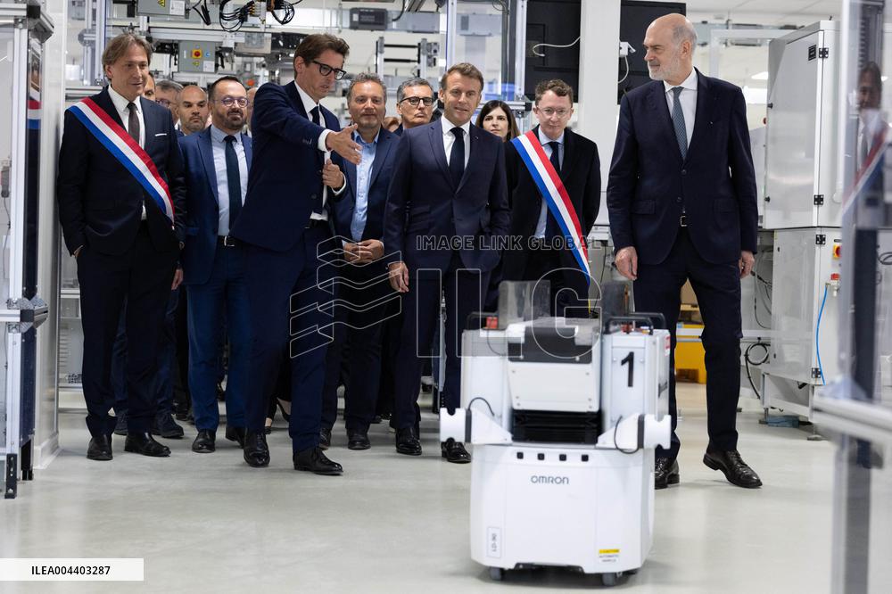 President Macron Visits EssilorLuxottica Laboratory - Wissous