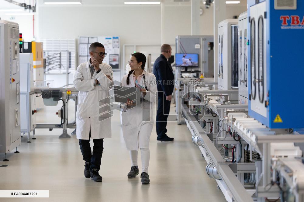 President Macron Visits EssilorLuxottica Laboratory - Wissous