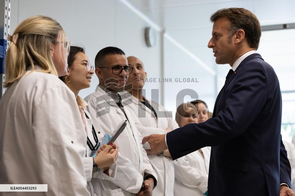 President Macron Visits EssilorLuxottica Laboratory - Wissous