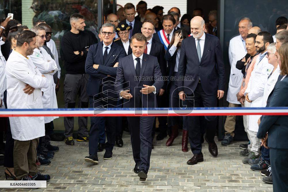 President Macron Visits EssilorLuxottica Laboratory - Wissous
