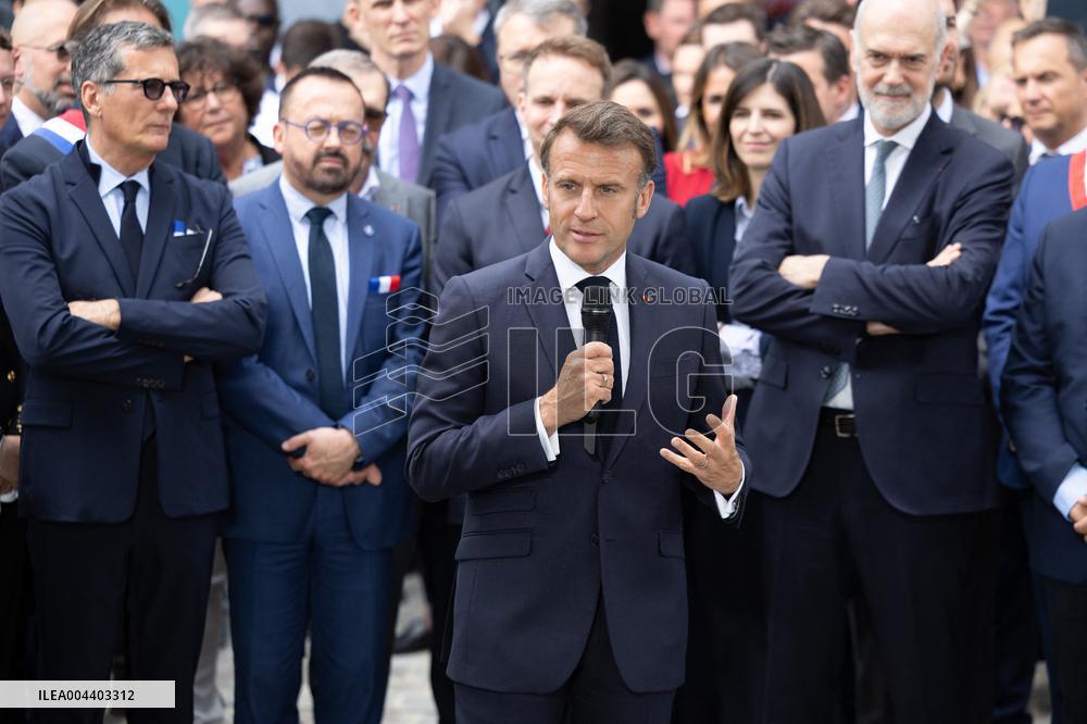 President Macron Visits EssilorLuxottica Laboratory - Wissous