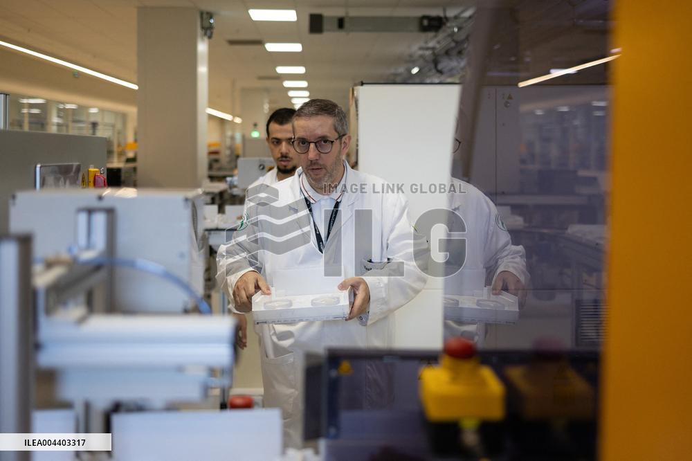 President Macron Visits EssilorLuxottica Laboratory - Wissous
