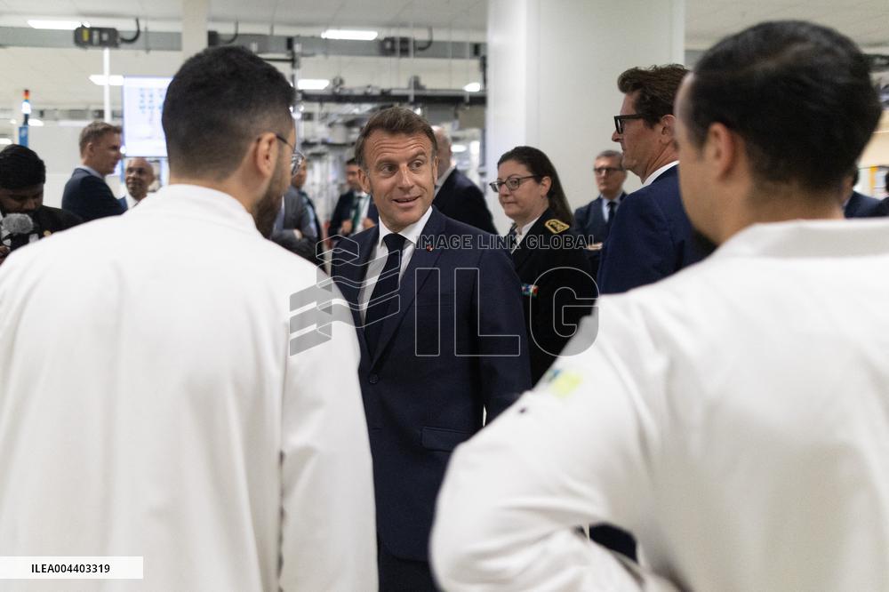 President Macron Visits EssilorLuxottica Laboratory - Wissous