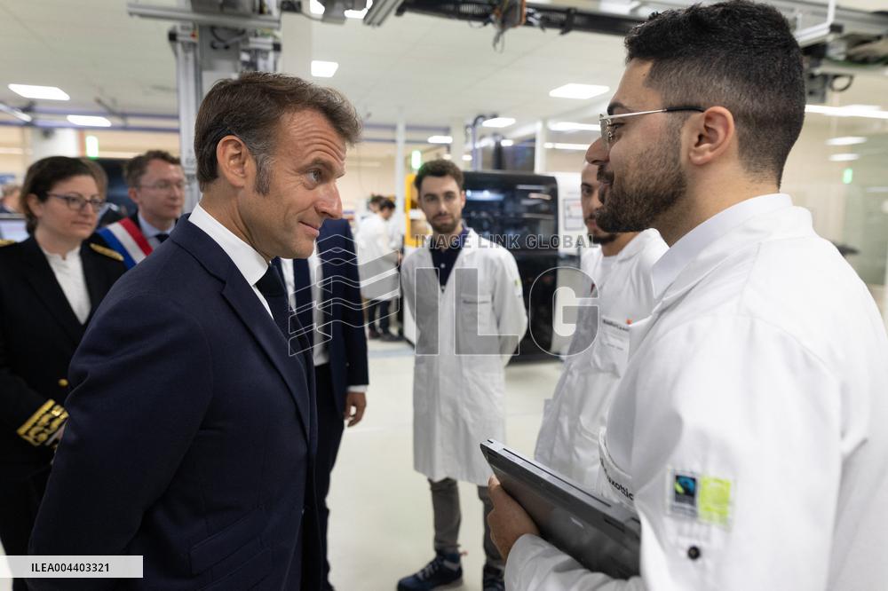 President Macron Visits EssilorLuxottica Laboratory - Wissous