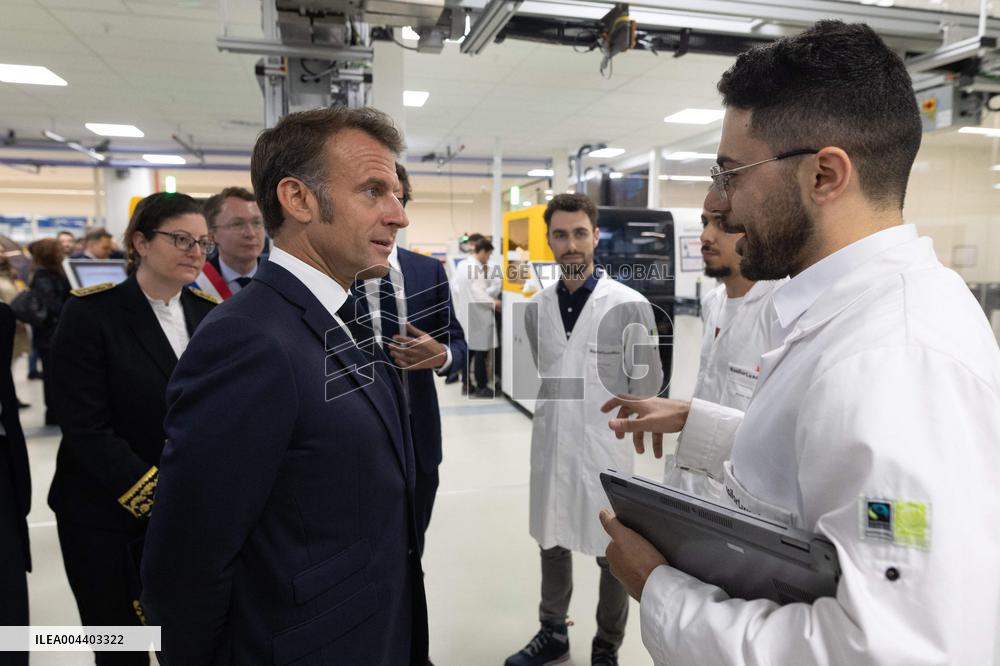 President Macron Visits EssilorLuxottica Laboratory - Wissous
