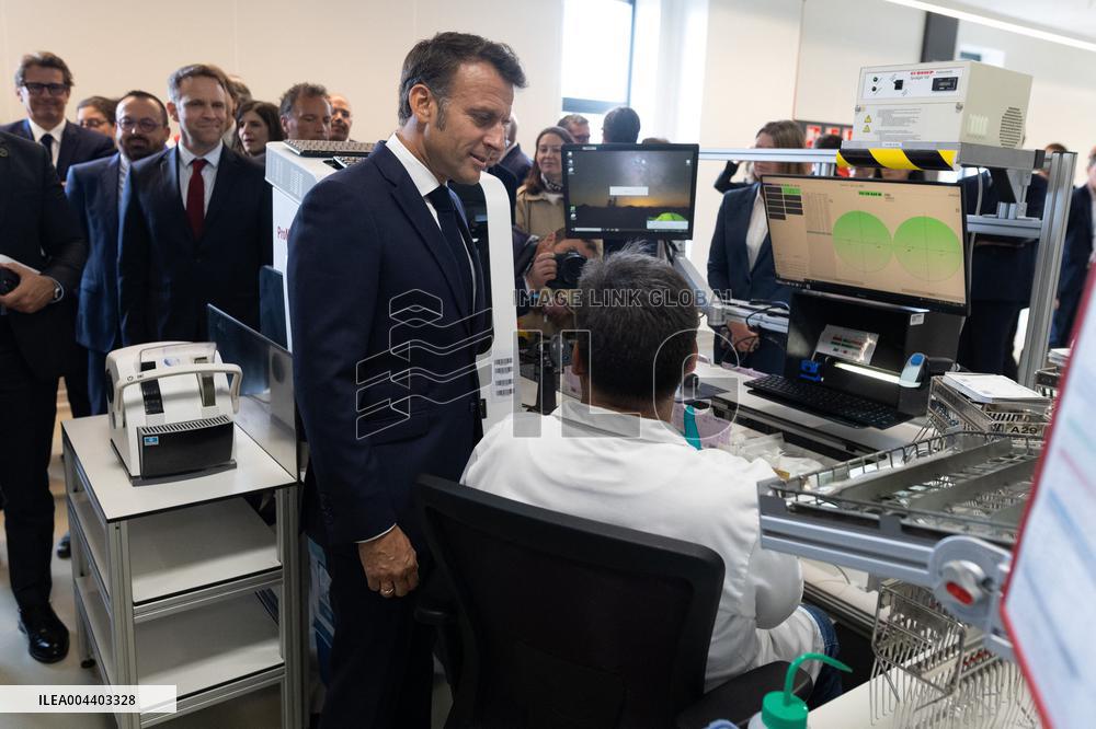 President Macron Visits EssilorLuxottica Laboratory - Wissous