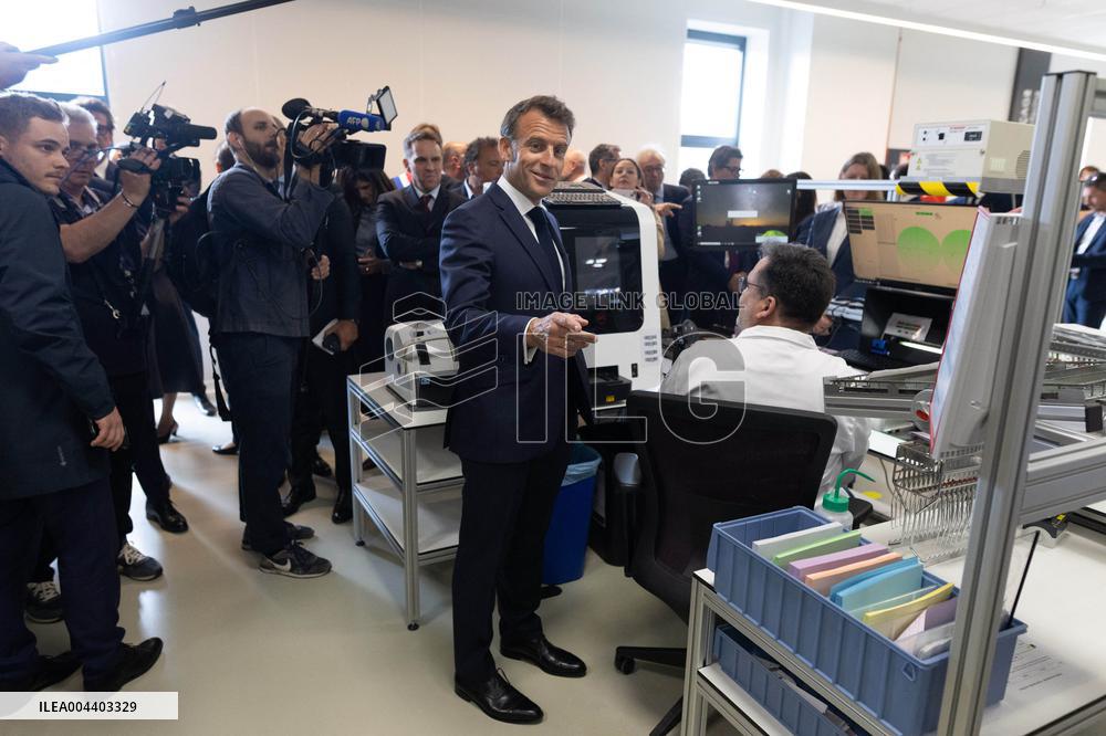 President Macron Visits EssilorLuxottica Laboratory - Wissous