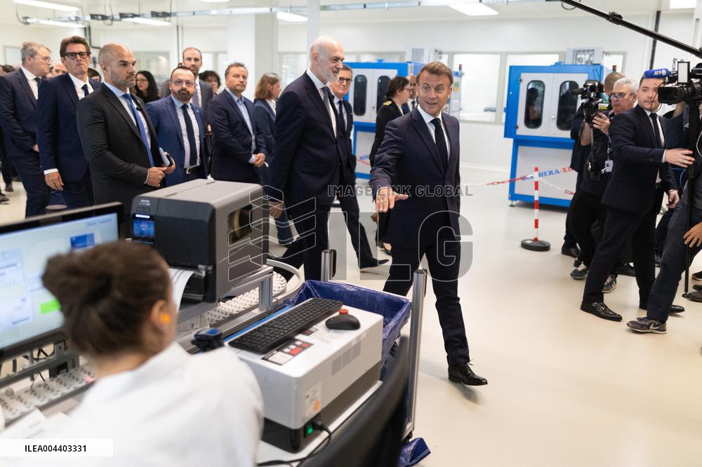President Macron Visits EssilorLuxottica Laboratory - Wissous