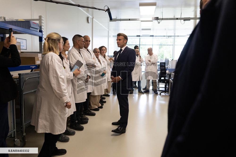 President Macron Visits EssilorLuxottica Laboratory - Wissous