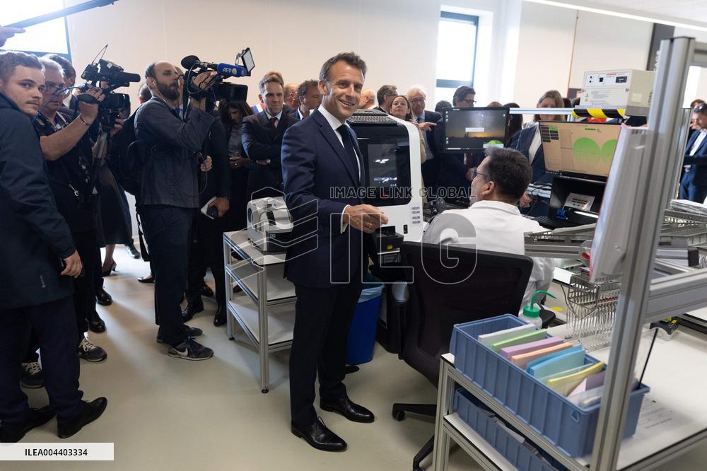 President Macron Visits EssilorLuxottica Laboratory - Wissous
