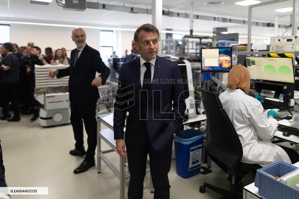 President Macron Visits EssilorLuxottica Laboratory - Wissous