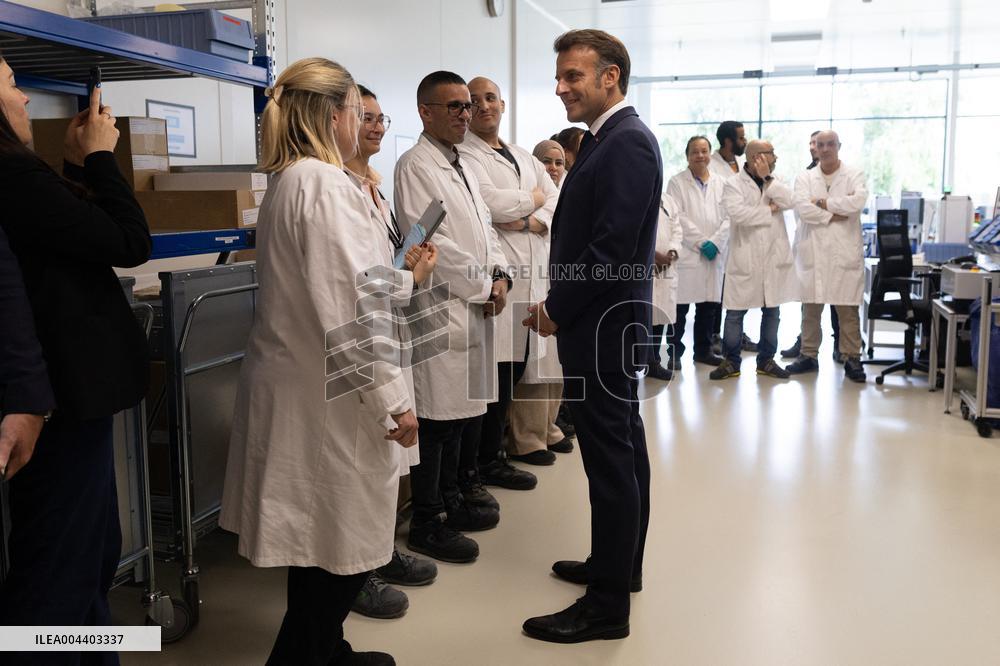 President Macron Visits EssilorLuxottica Laboratory - Wissous