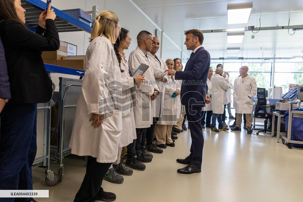 President Macron Visits EssilorLuxottica Laboratory - Wissous