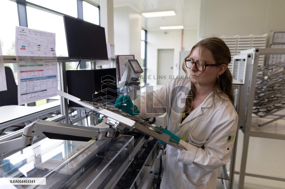 President Macron Visits EssilorLuxottica Laboratory - Wissous