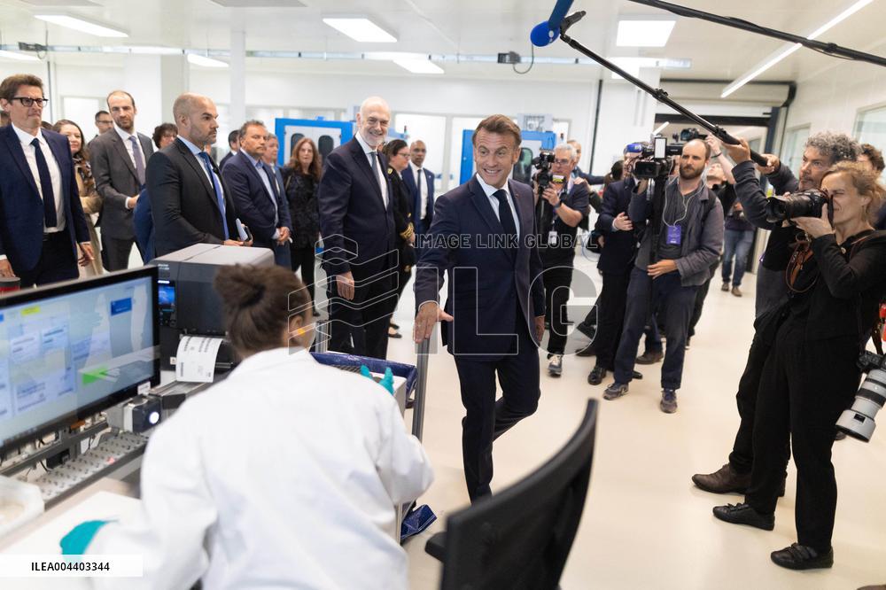 President Macron Visits EssilorLuxottica Laboratory - Wissous