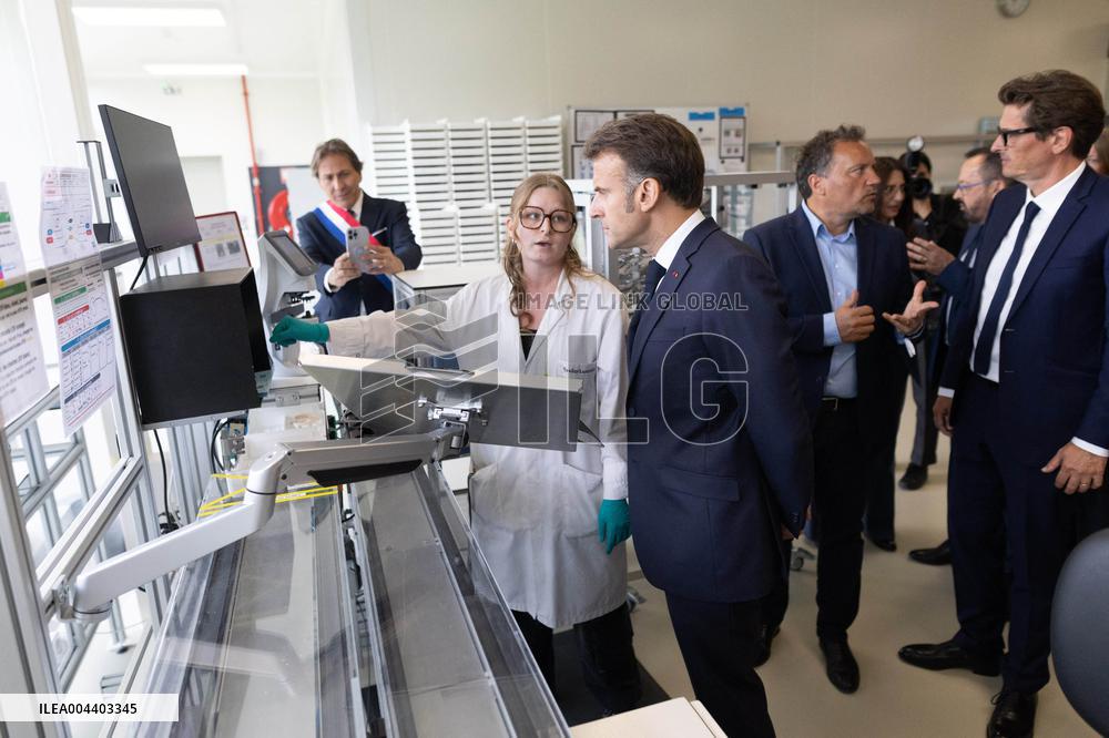 President Macron Visits EssilorLuxottica Laboratory - Wissous