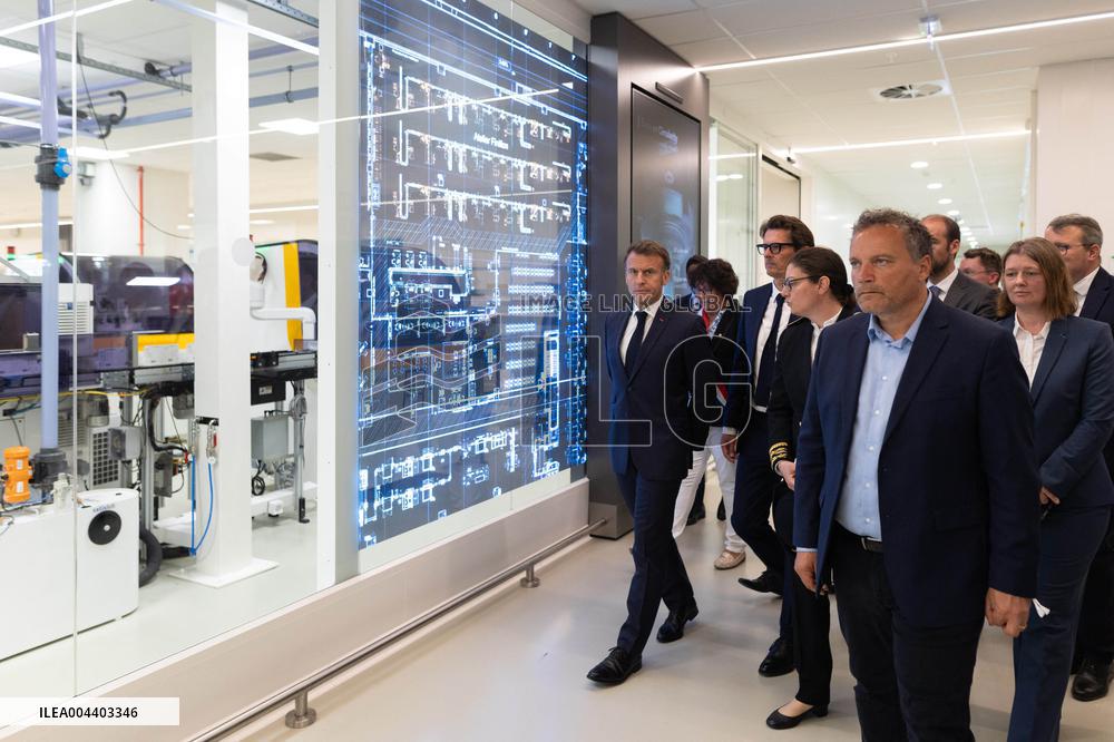 President Macron Visits EssilorLuxottica Laboratory - Wissous
