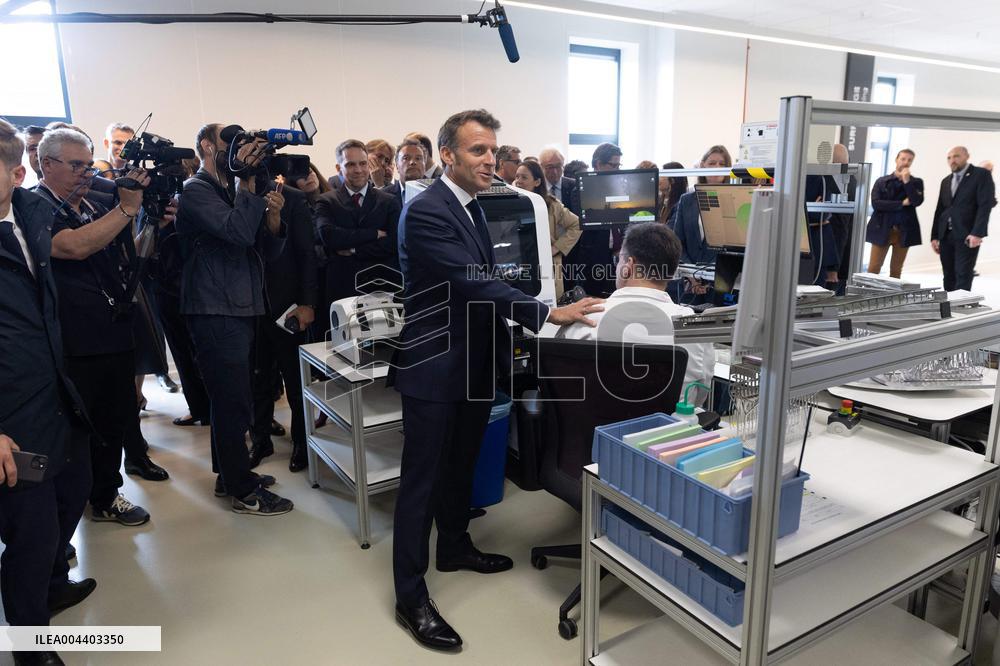 President Macron Visits EssilorLuxottica Laboratory - Wissous