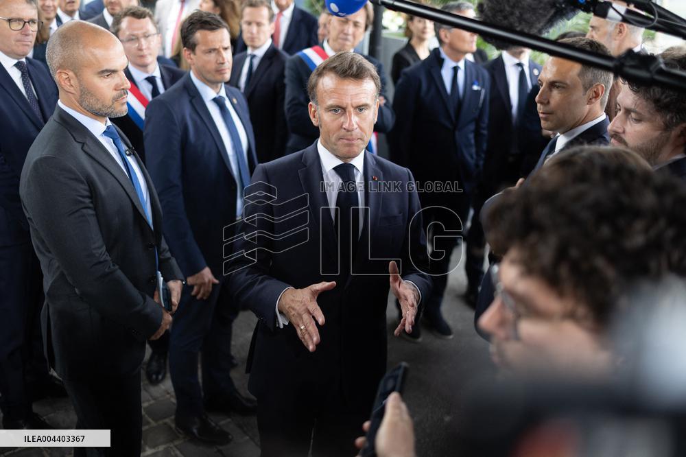 President Macron Visits EssilorLuxottica Laboratory - Wissous