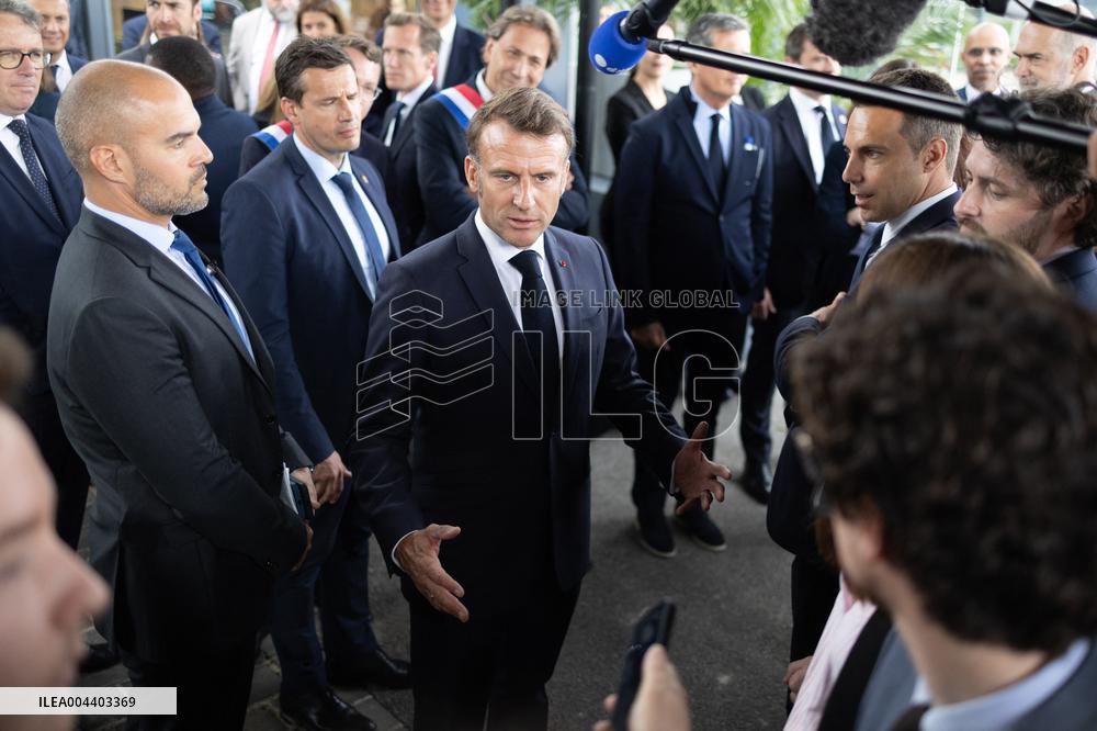 President Macron Visits EssilorLuxottica Laboratory - Wissous