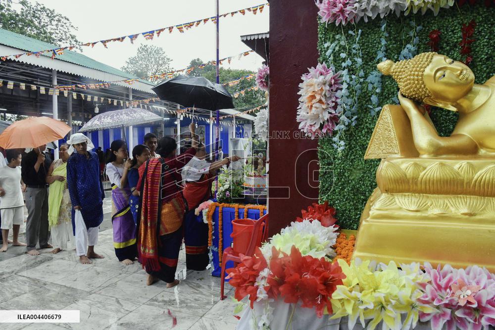 Devotees Pray at Buddha Temple - India