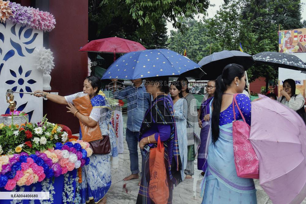 Devotees Pray at Buddha Temple - India