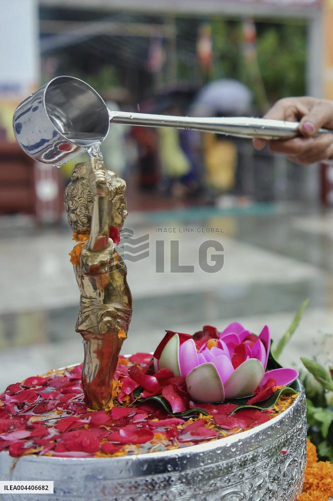 Devotees Pray at Buddha Temple - India