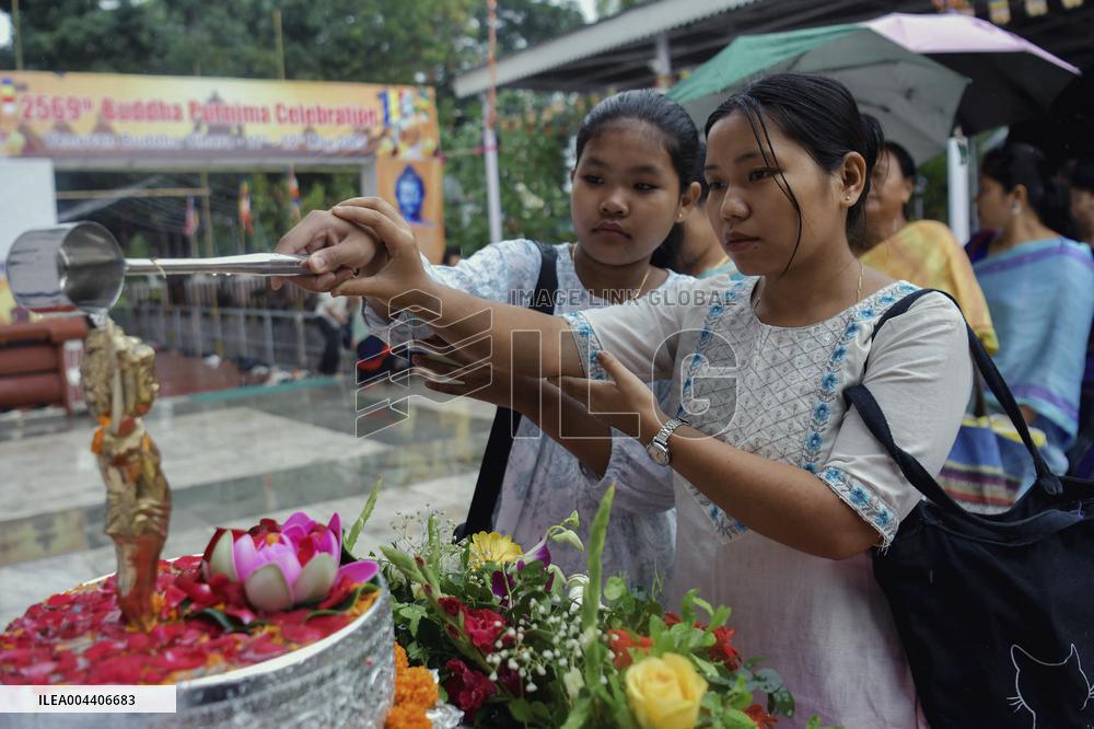 Devotees Pray at Buddha Temple - India