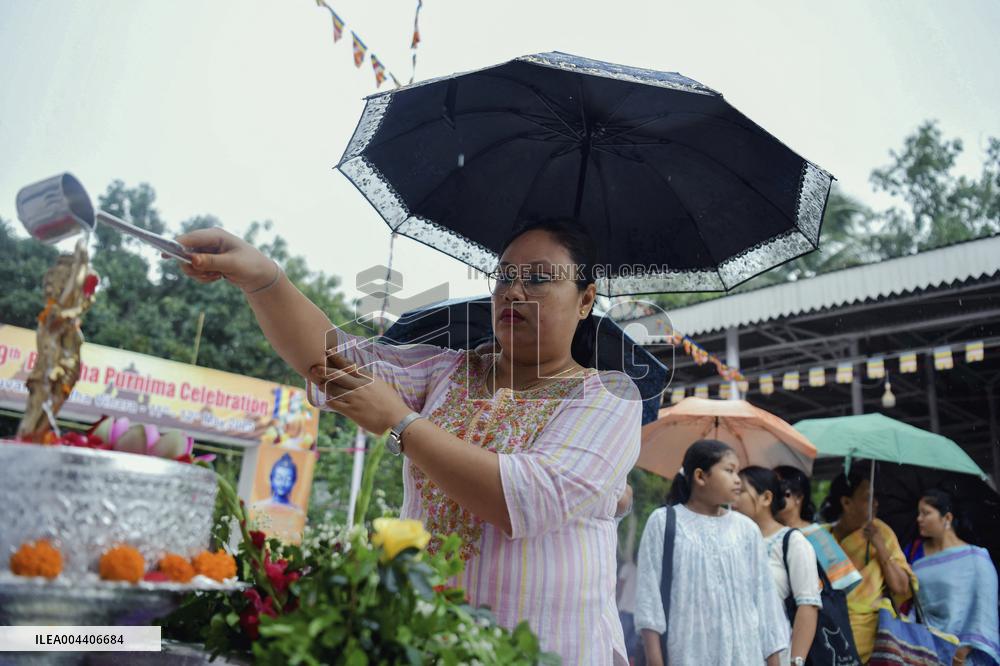 Devotees Pray at Buddha Temple - India