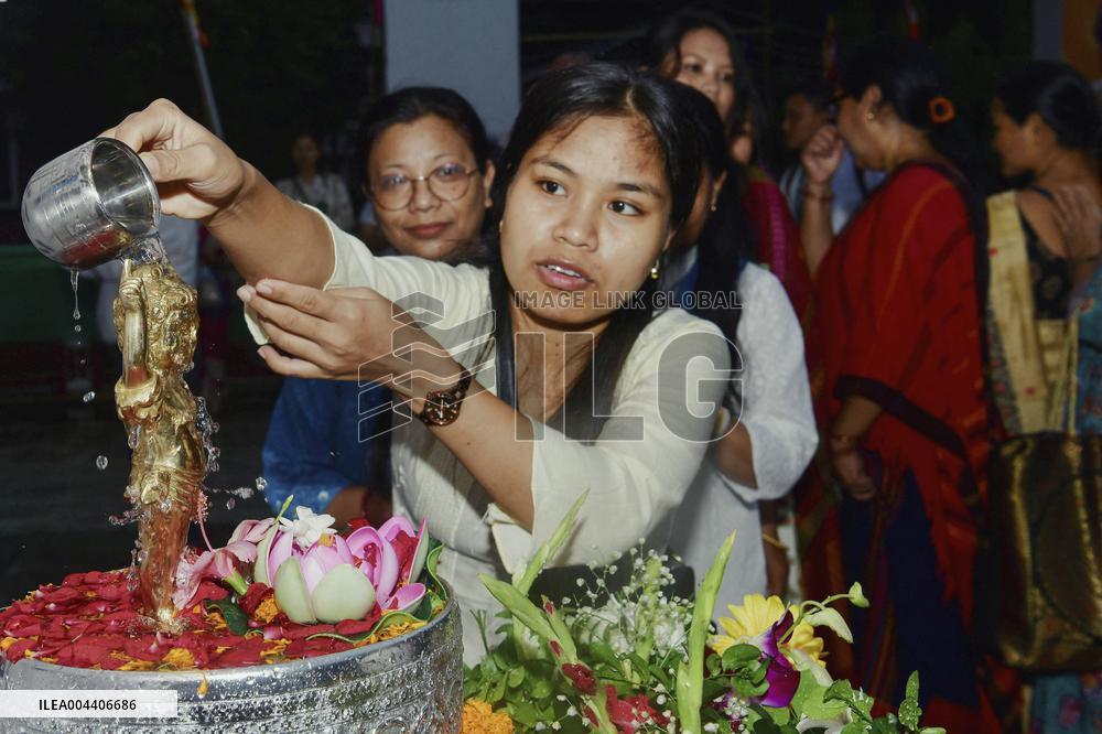 Devotees Pray at Buddha Temple - India