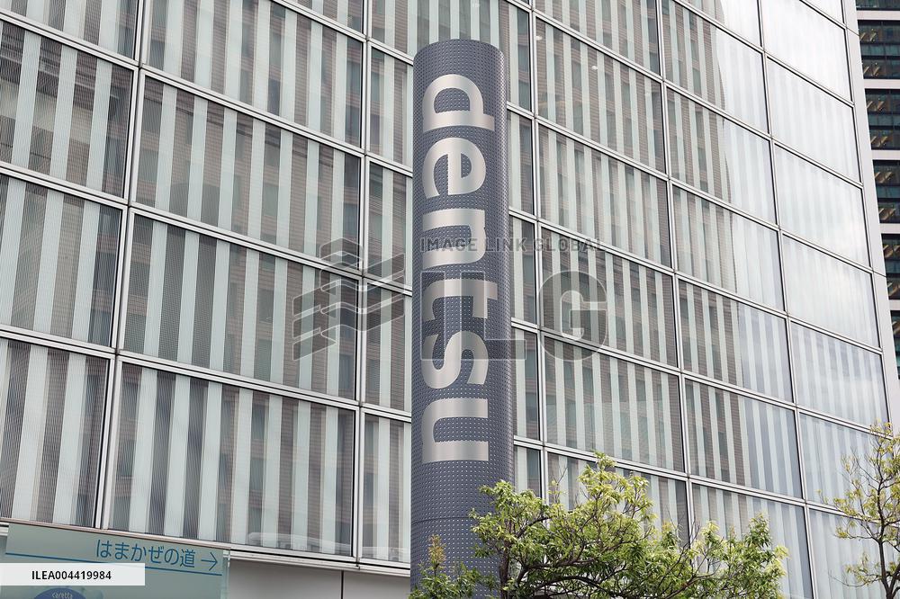 Dentsu exterior, logo and signage