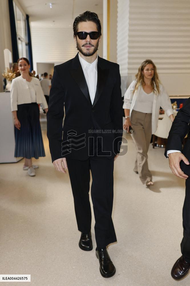 Cannes Raphael Quenard, Francois Civil, Michel Hazanavicius walk with condor from Hotel Martinez MP
