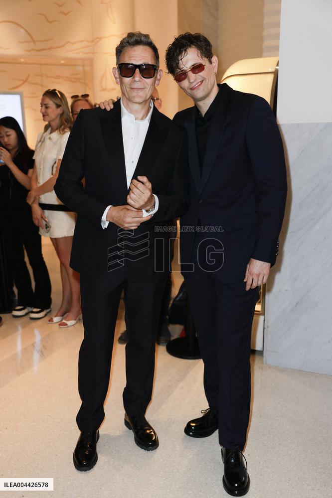 Cannes Raphael Quenard, Francois Civil, Michel Hazanavicius walk with condor from Hotel Martinez MP
