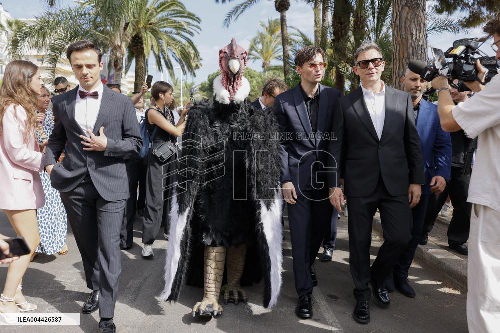 Cannes Raphael Quenard, Francois Civil, Michel Hazanavicius walk with condor from Hotel Martinez MP