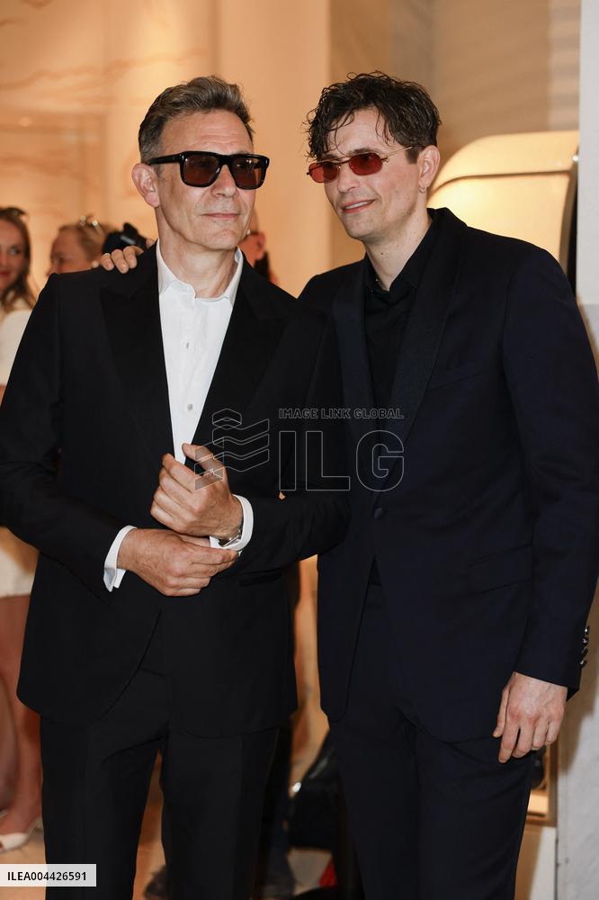 Cannes Raphael Quenard, Francois Civil, Michel Hazanavicius walk with condor from Hotel Martinez MP